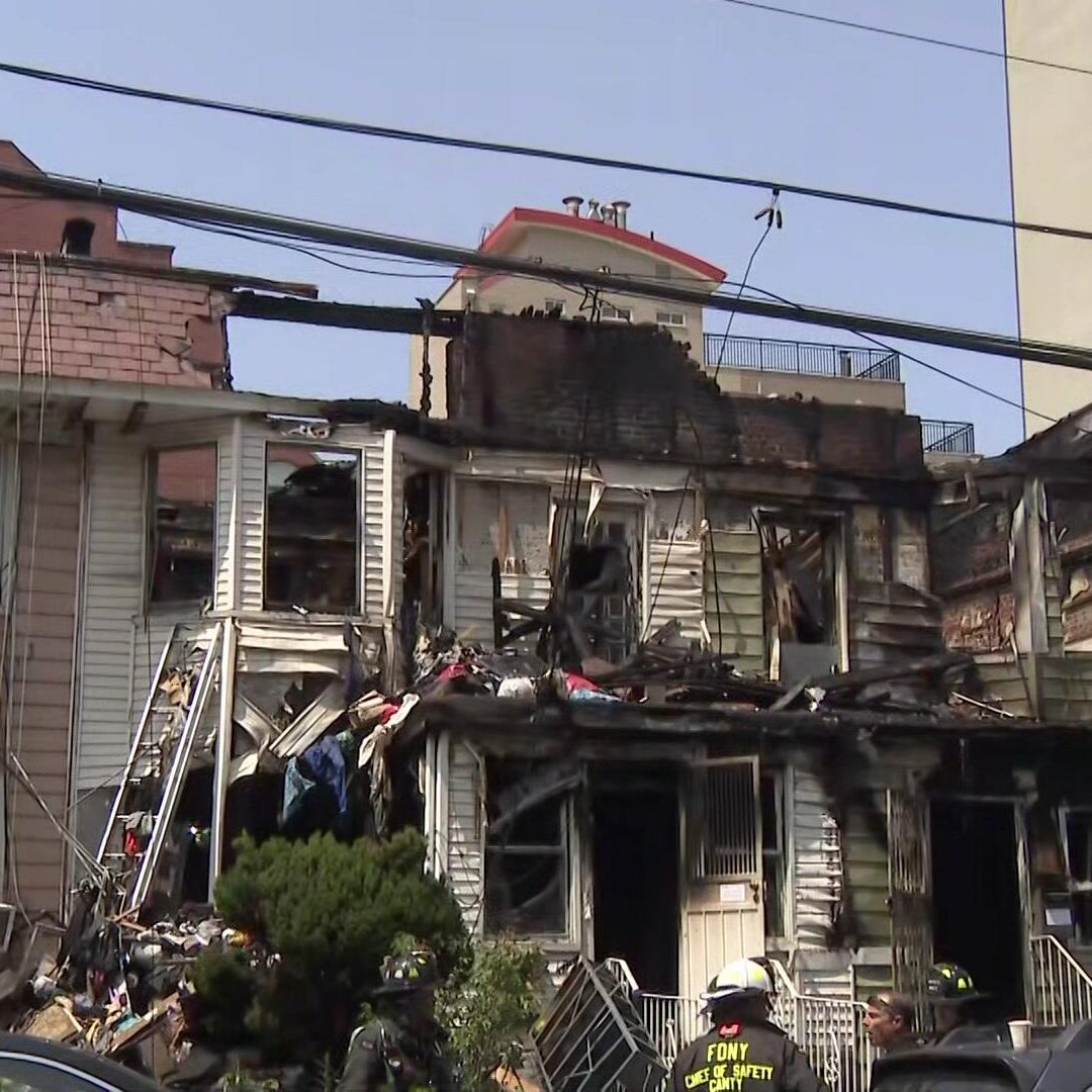 1 dead, nearly 2 dozen hurt after Queens fire spreads to 3 buildings, officials say