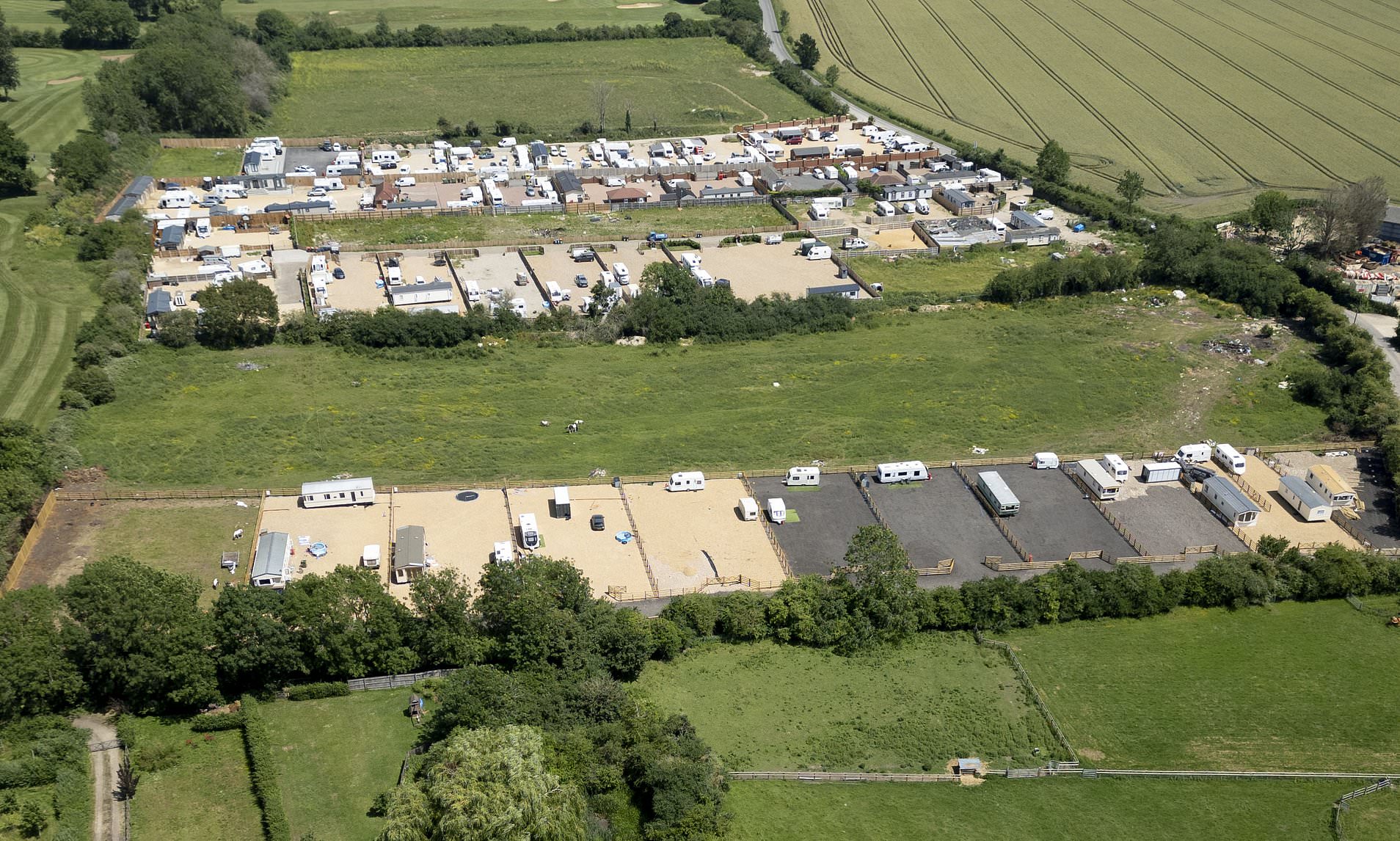 Travellers 'hook up their illegal camp to electricity grid' and water network