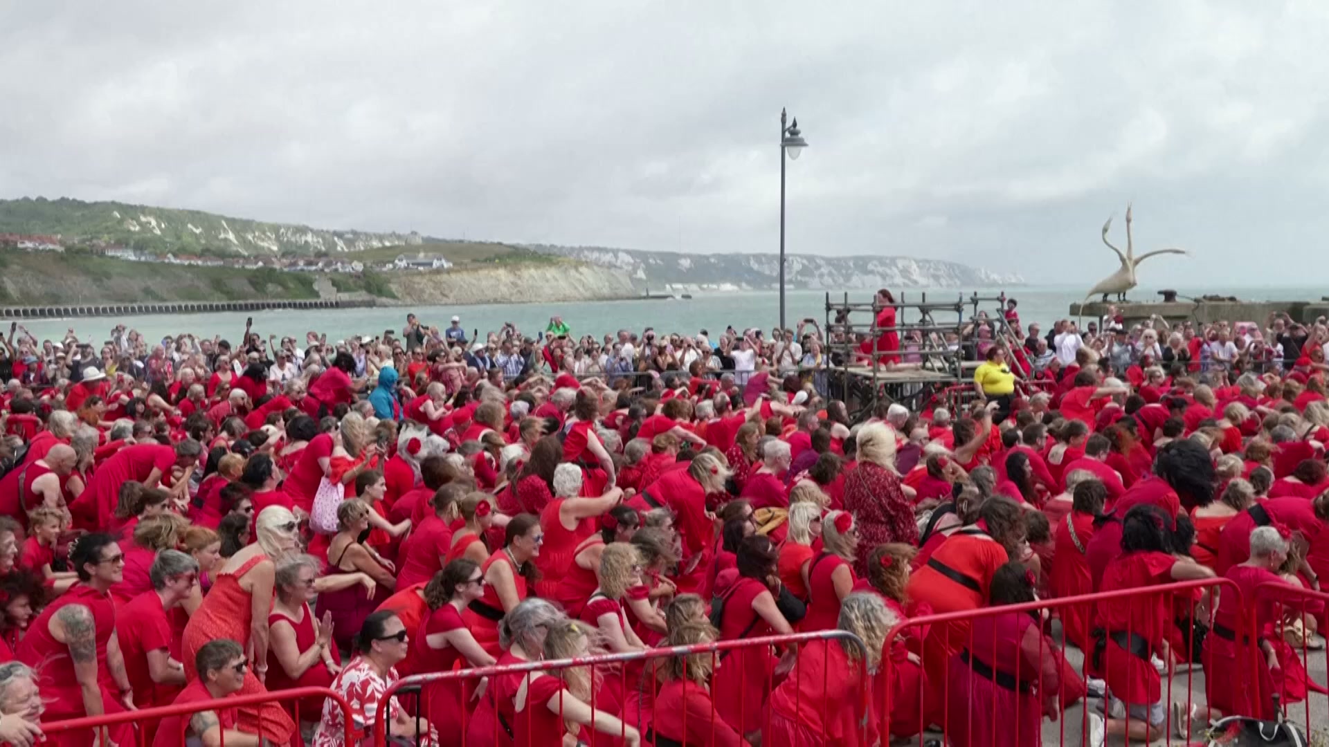 Hundreds dressed in red recreate Kate Bush’s Wuthering Heights dance