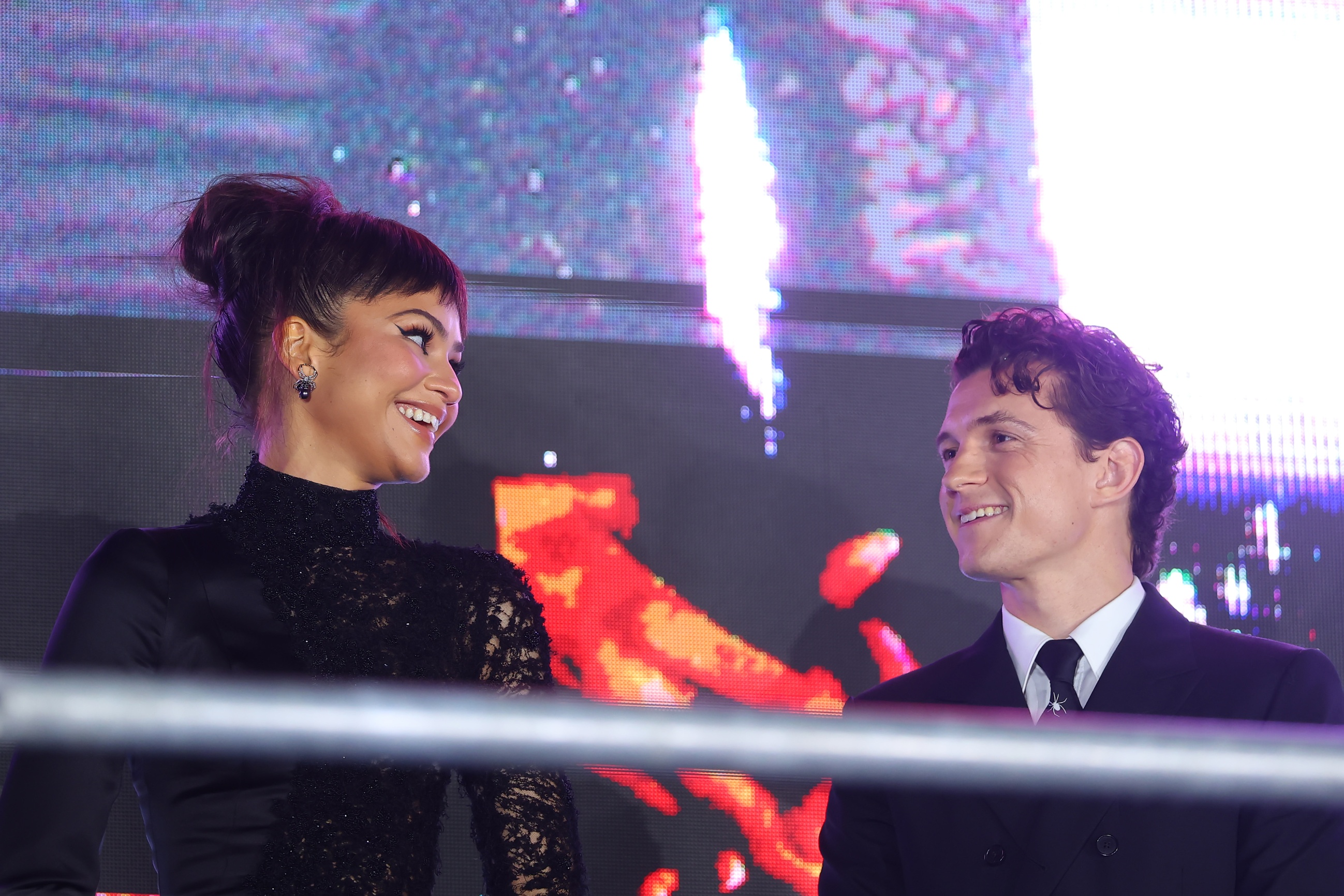 Tom Holland and Zendaya react to surprise 'Titanium' flash mob at Paris Spider-Man event