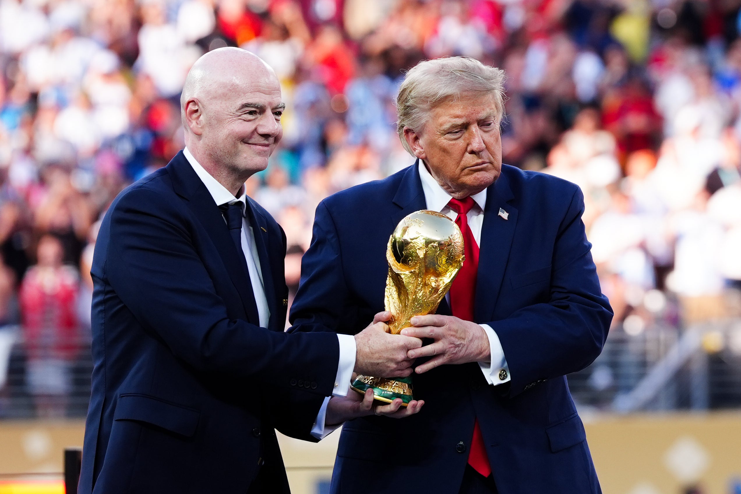 Gianni Infantino (left) may find his position in peril (PA Wire)