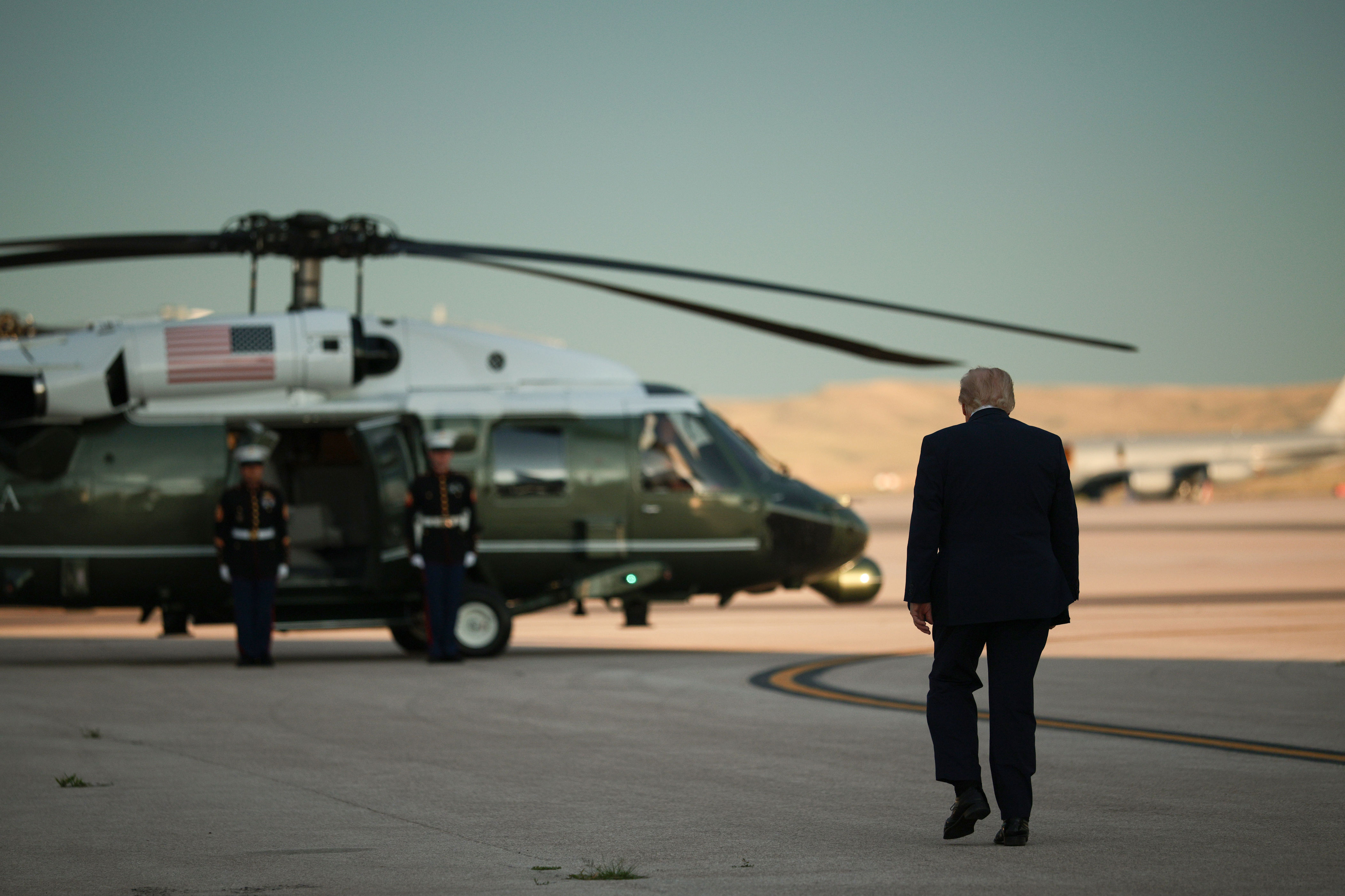 Trump in Michigan to sell economy as GOP fears midterm fallout
