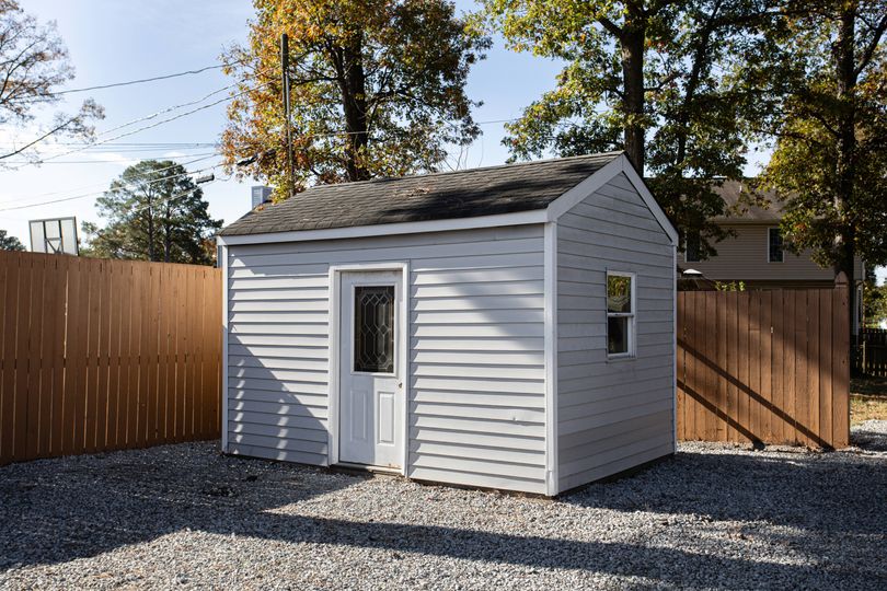 Your legal rights if a neighbour's shed is too close to your garden fence
