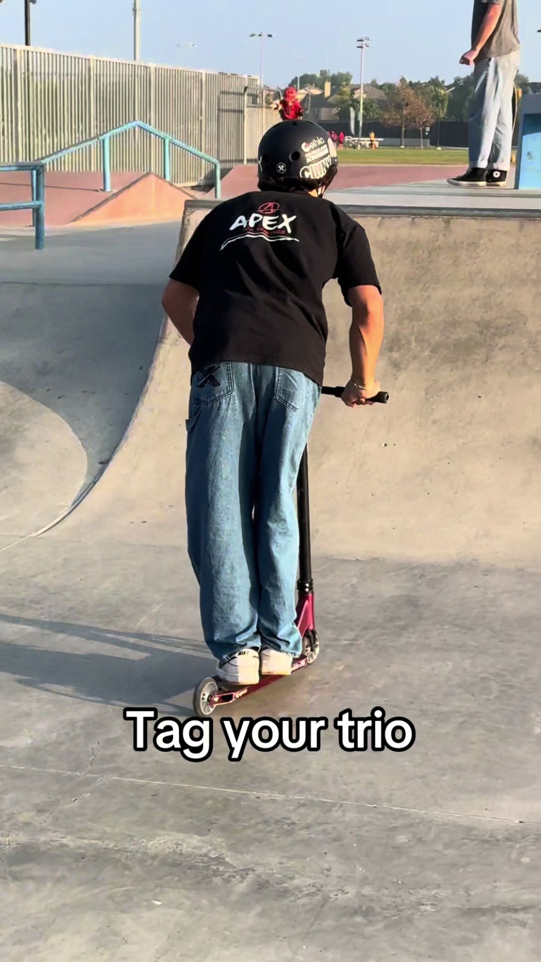 Scooter rider lands an impressive skatepark trick