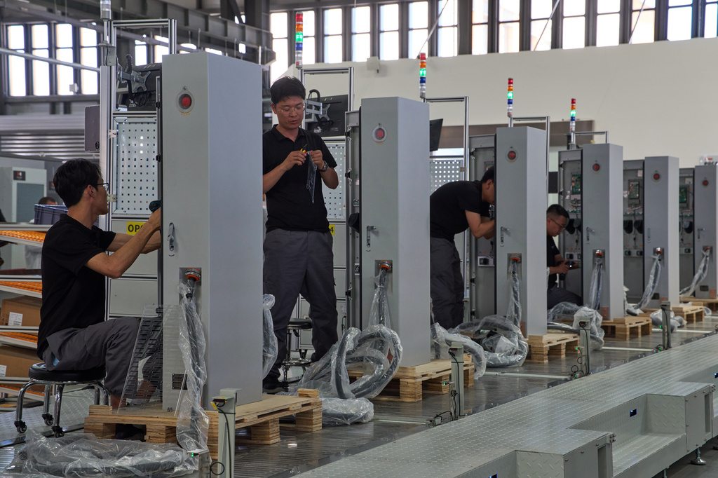 China hits back at criticism over excess industrial capacity as more US ...