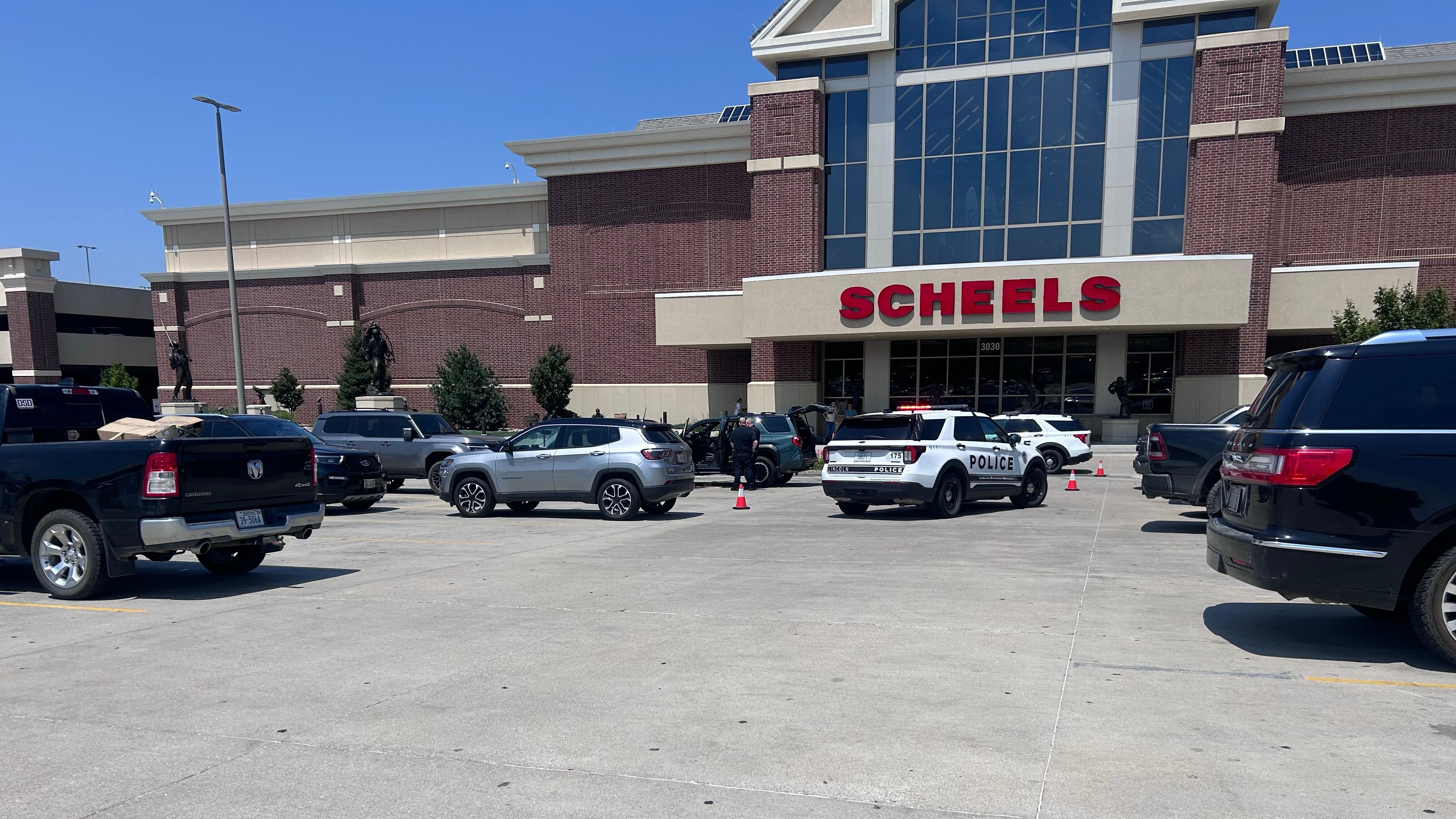 Man accidentally shoots himself while filming video outside Scheels in ...