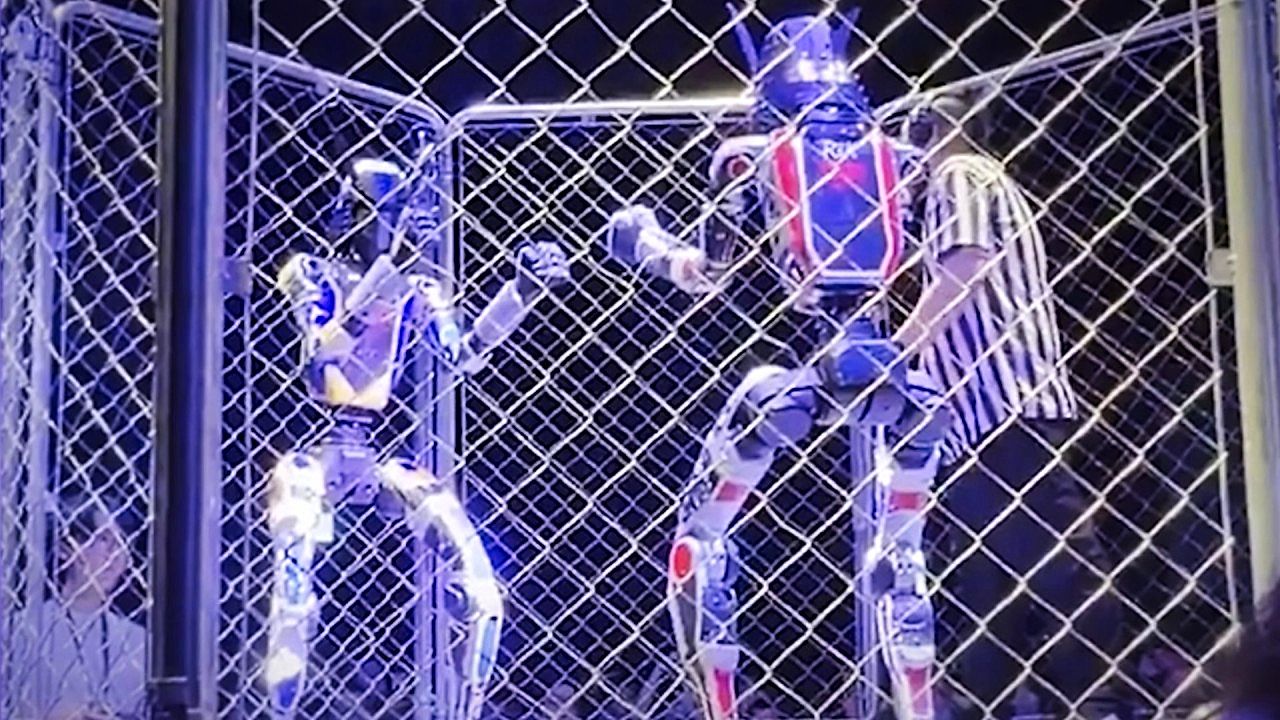 Humanoid robots trade kicks at Japan's first full-contact robot tournament