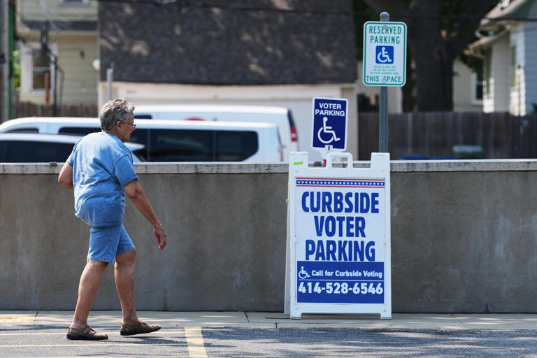 Wisconsin Democrats casting early ballots are divided over whether ...