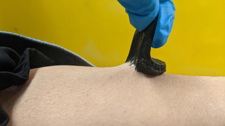 Soft, sticky, stretchable biosensors can pick up signals through hair ...