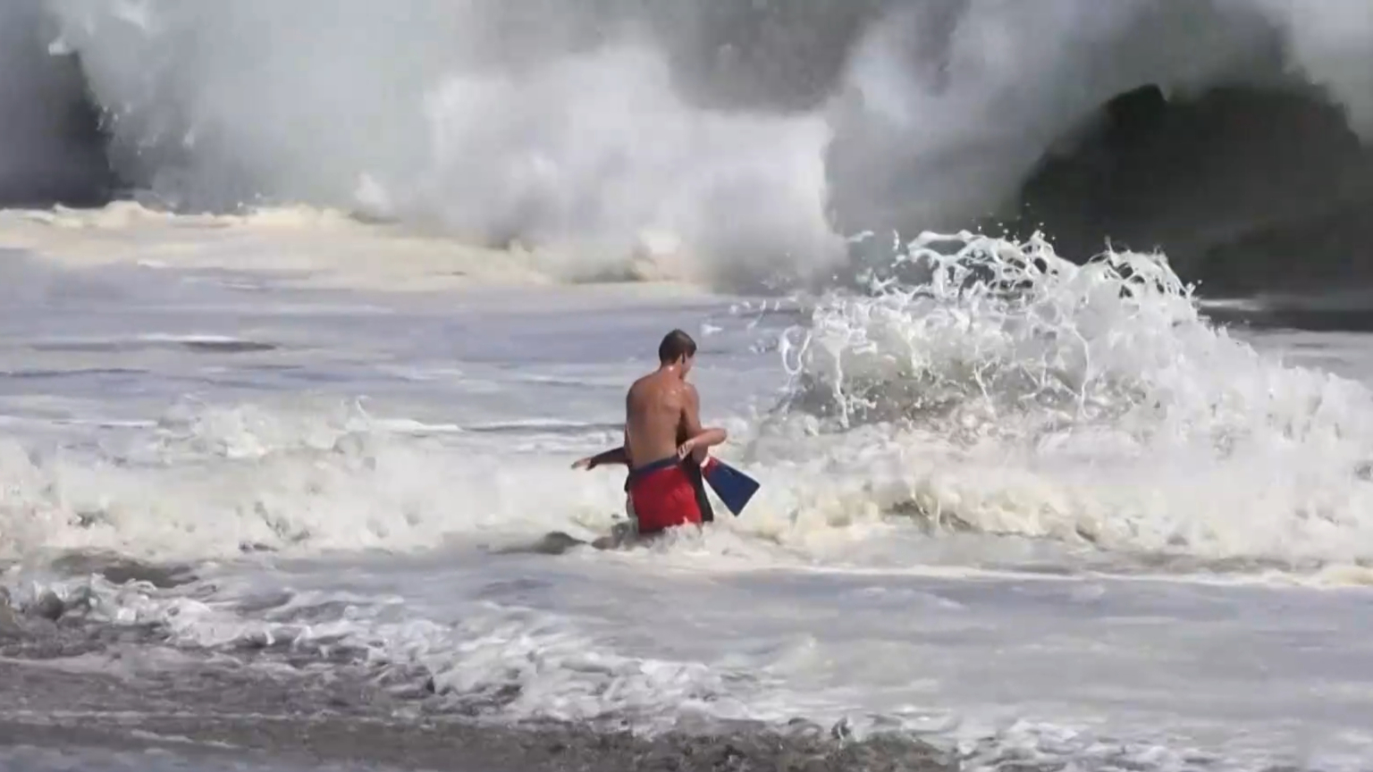 US lifeguard drags 10-year-old to shore in heart-stopping beach rescue