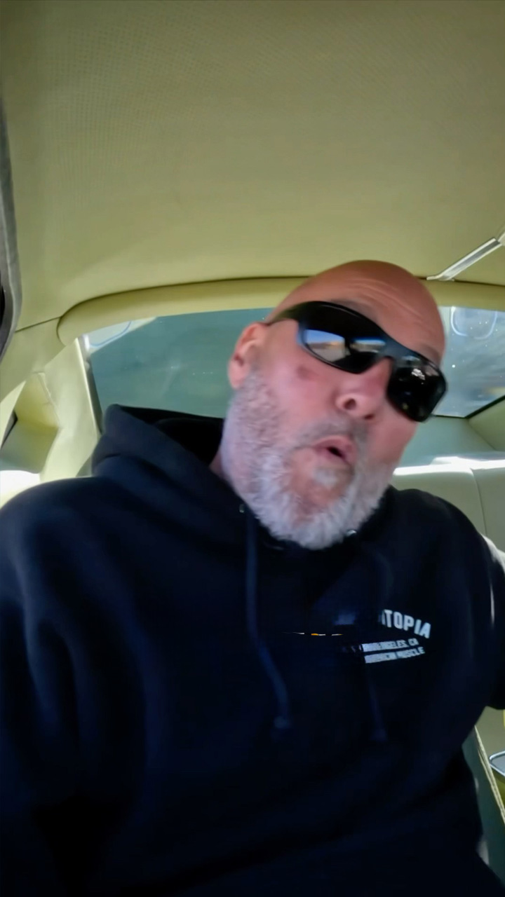 Passenger loses it during a wild muscle car drift