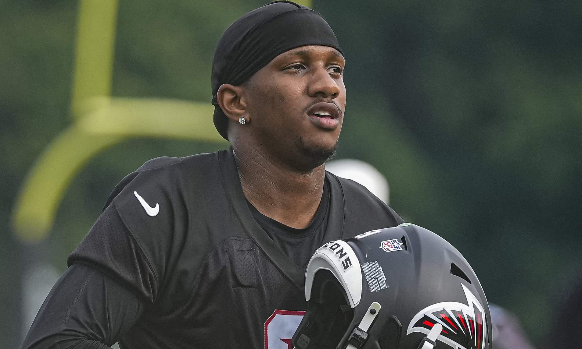 NFL team starts camp in chaos with two quarterbacks injured and star man skipping practice