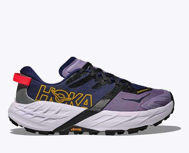 Athletic running shoe with cushioning and a bold logo design