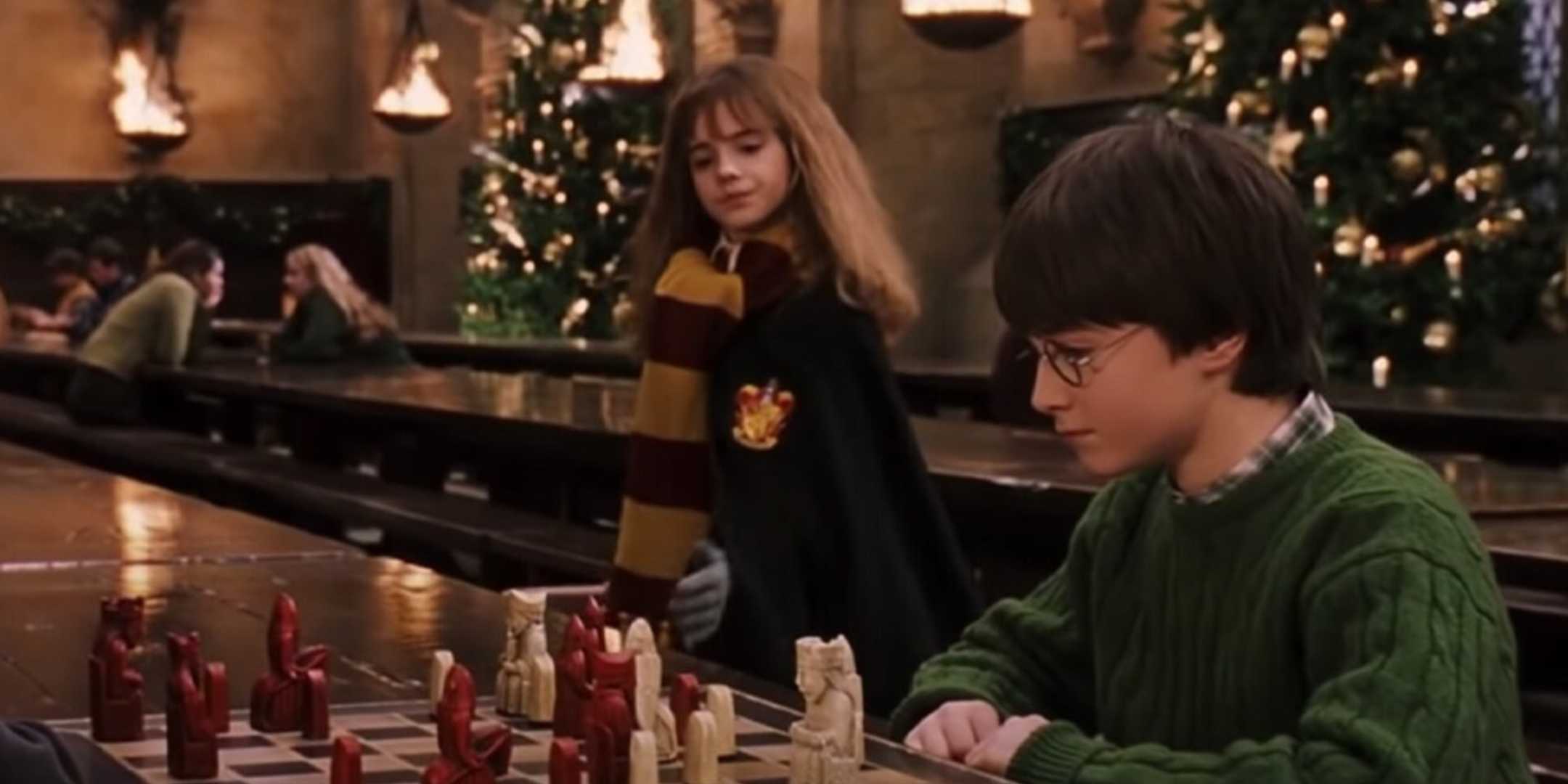Hermione and Harry in Hogwarts great hall on Christmas
