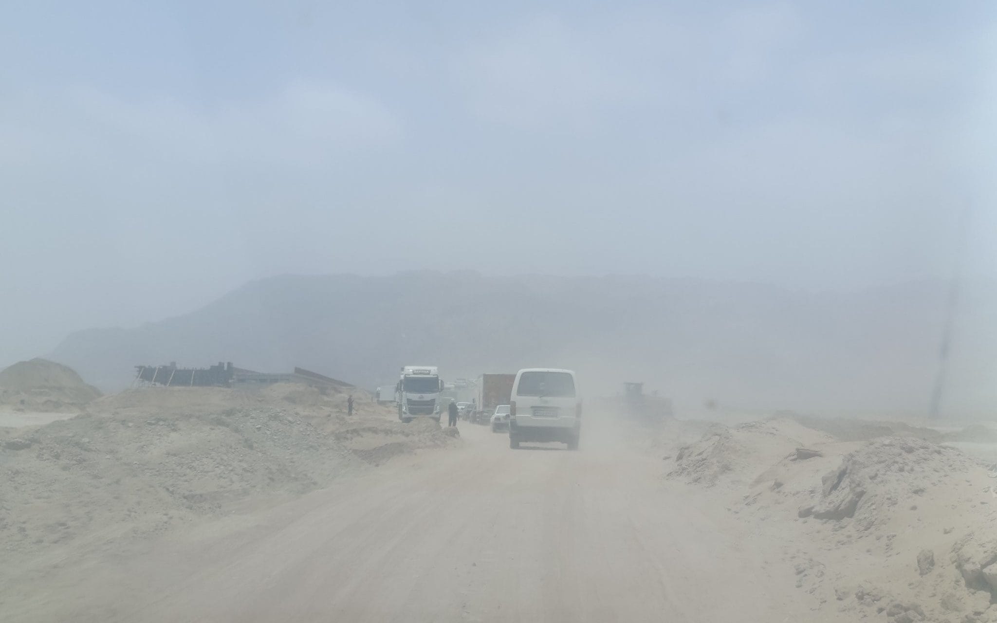 An image posted on X, captioned that 'people who used to have a 10-minute route have to spend hours stuck on the road and face danger at every moment'