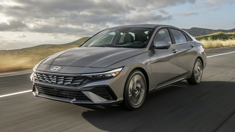 gray 2026 Hyundai Elantra driving down an open road