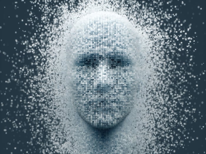 A humanoid face representing artificial intelligence that's emerging from a sea of pixels.