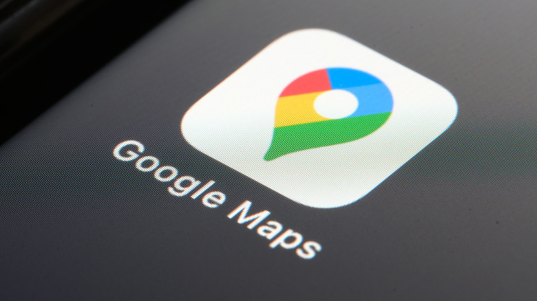 The Google Maps icon as displayed on a smartphone screen against a black and gray background﻿