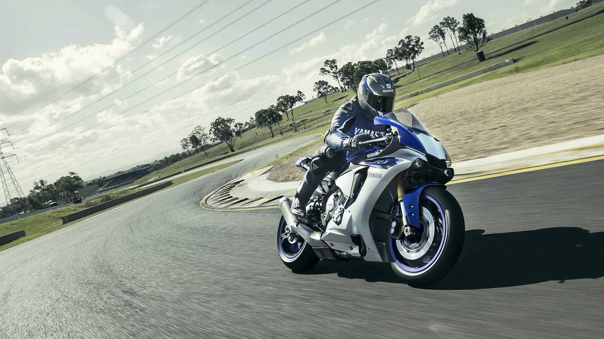 Action shot of a 2015 Yamaha YZF-R1 cornering on track