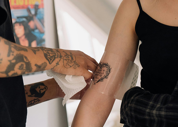 Woman Stunned by Parents' Reaction to Her Tattoo, Internet Calls for Firm Boundaries
