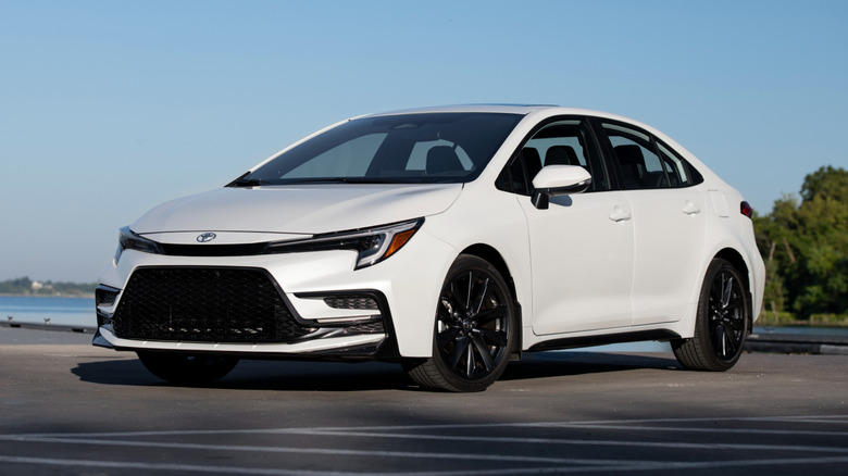 white chill pearl 2026 Toyota Corolla XSE parked at a harbor