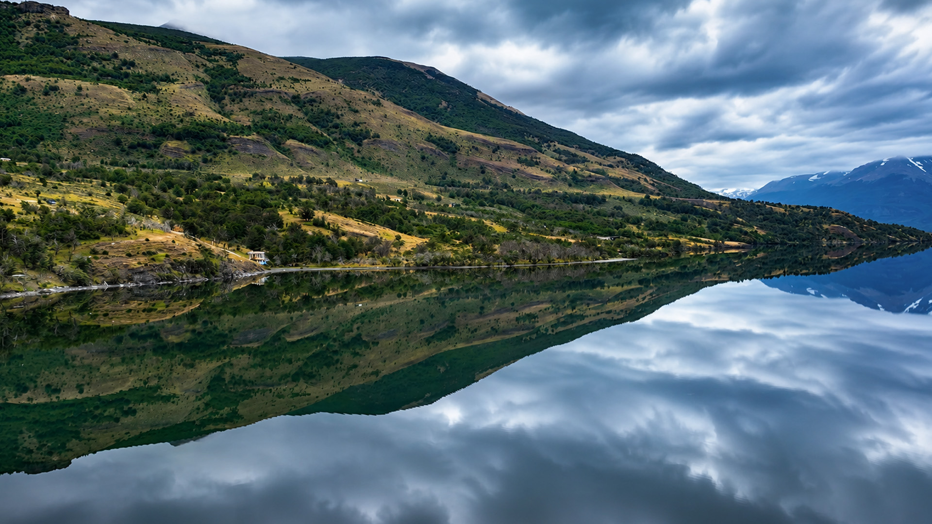 A lake that reflects an entire mountain