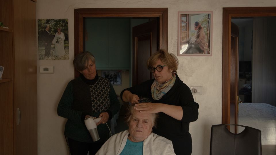 Barbara and Giovanna Tesserin care for their mother, who passed away shortly before the arrival of the blue crab. They say they are grateful she did not have to witness the devastation the crabs brought to their work and way of life. - Chiara Negrello