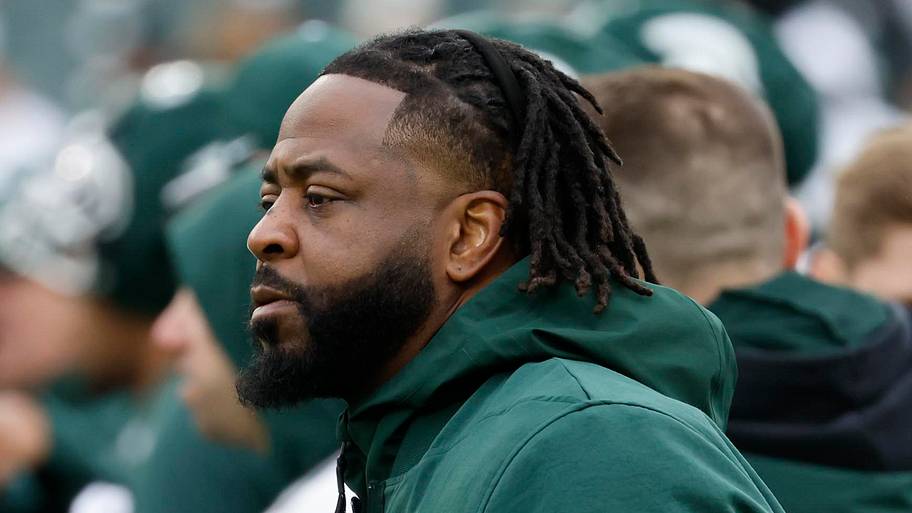 Michigan State Spartans cornerbacks coach Hank Poteat observes drills during MSU's