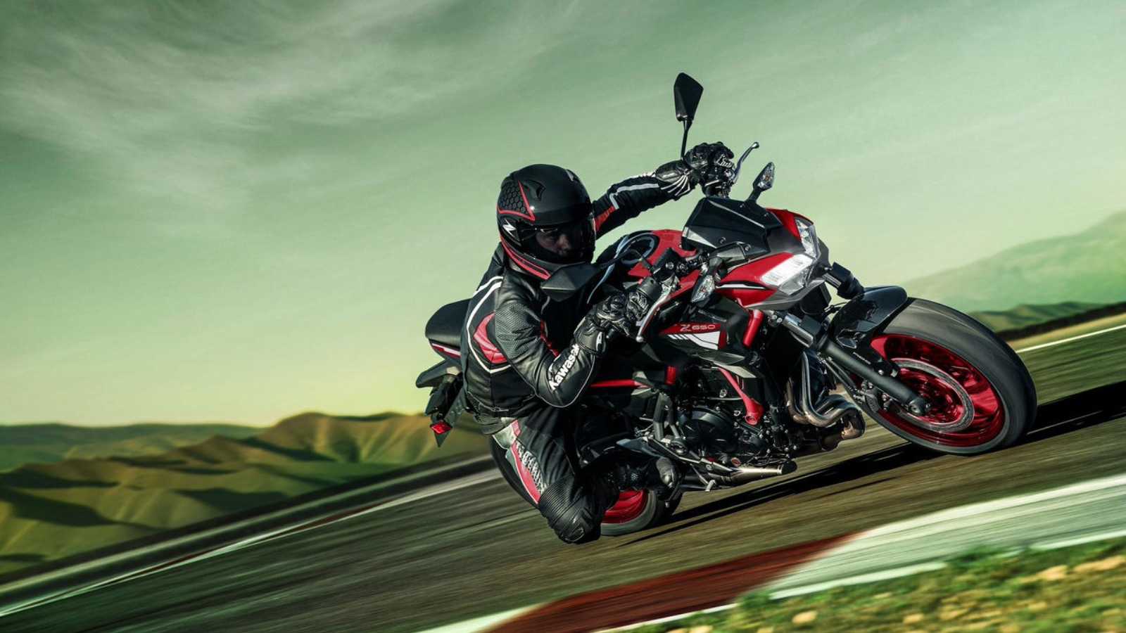 Kawasaki Z650 cornering front third quarter cinematic shot