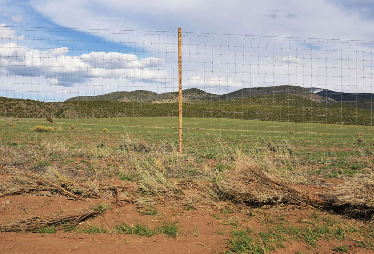 Texas billionaire refuses to change 8-foot Colorado ranch fence