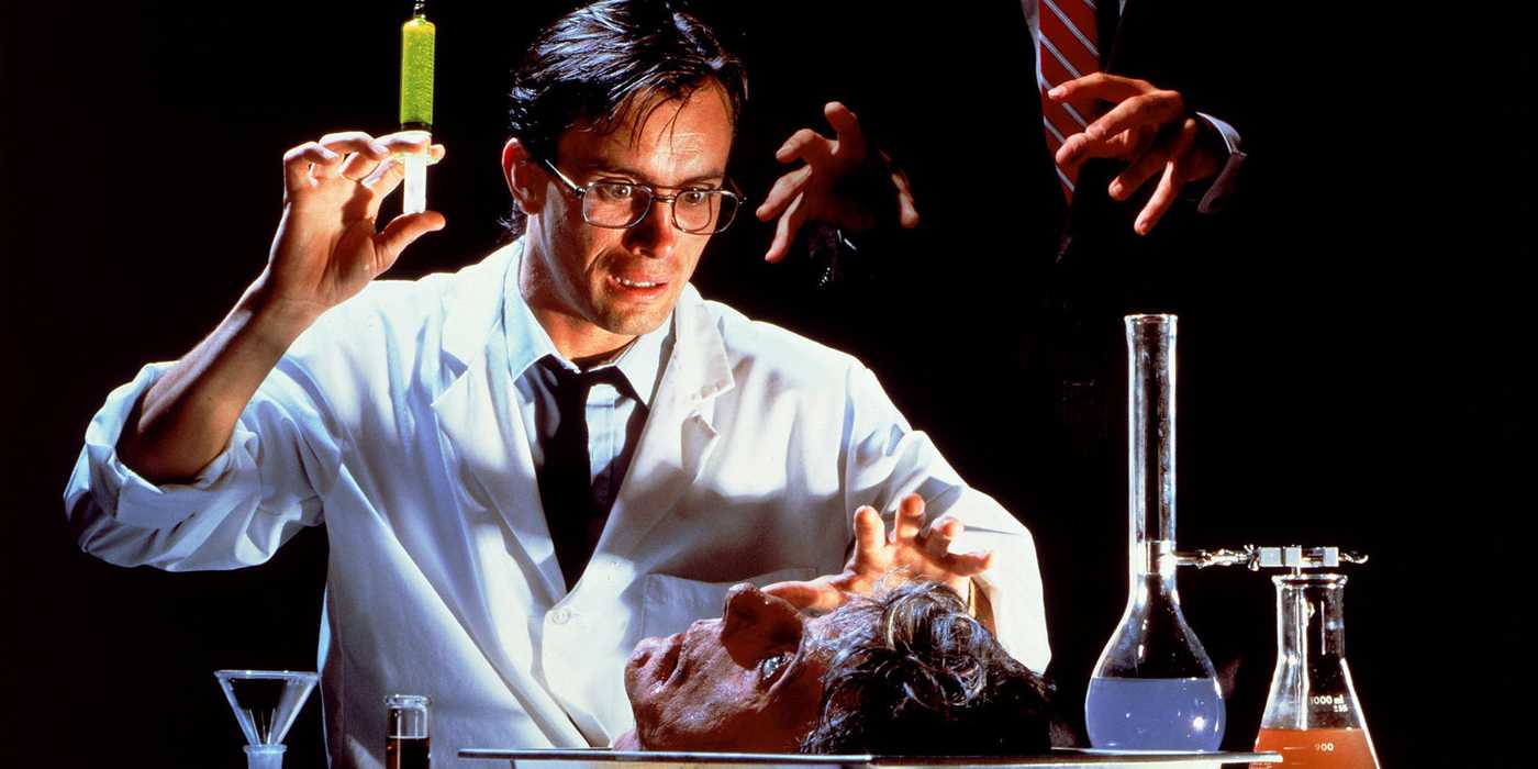 Herbert West from Re-Animator with a syringe in his hand