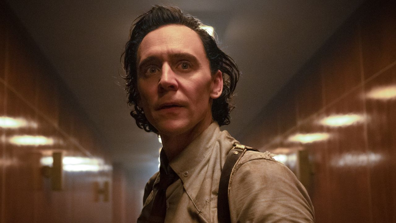 Loki (Tom Hiddleston) looks ahead in Loki.