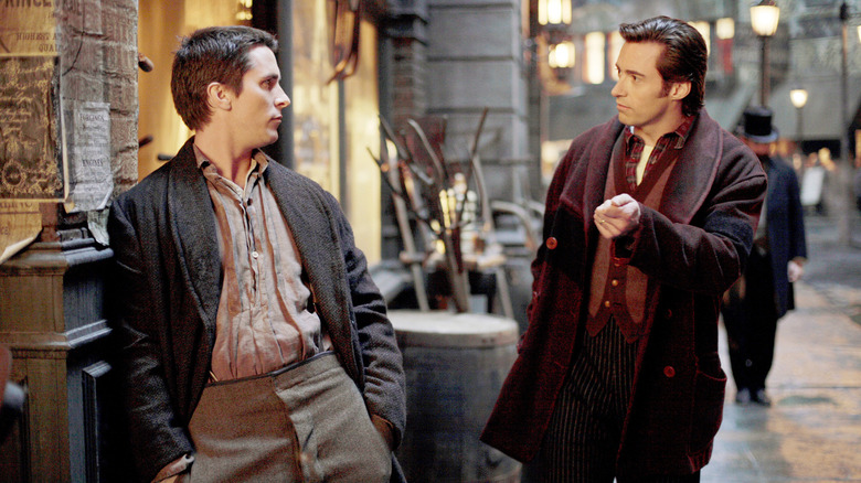Borden and Angier talking in the street in The Prestige