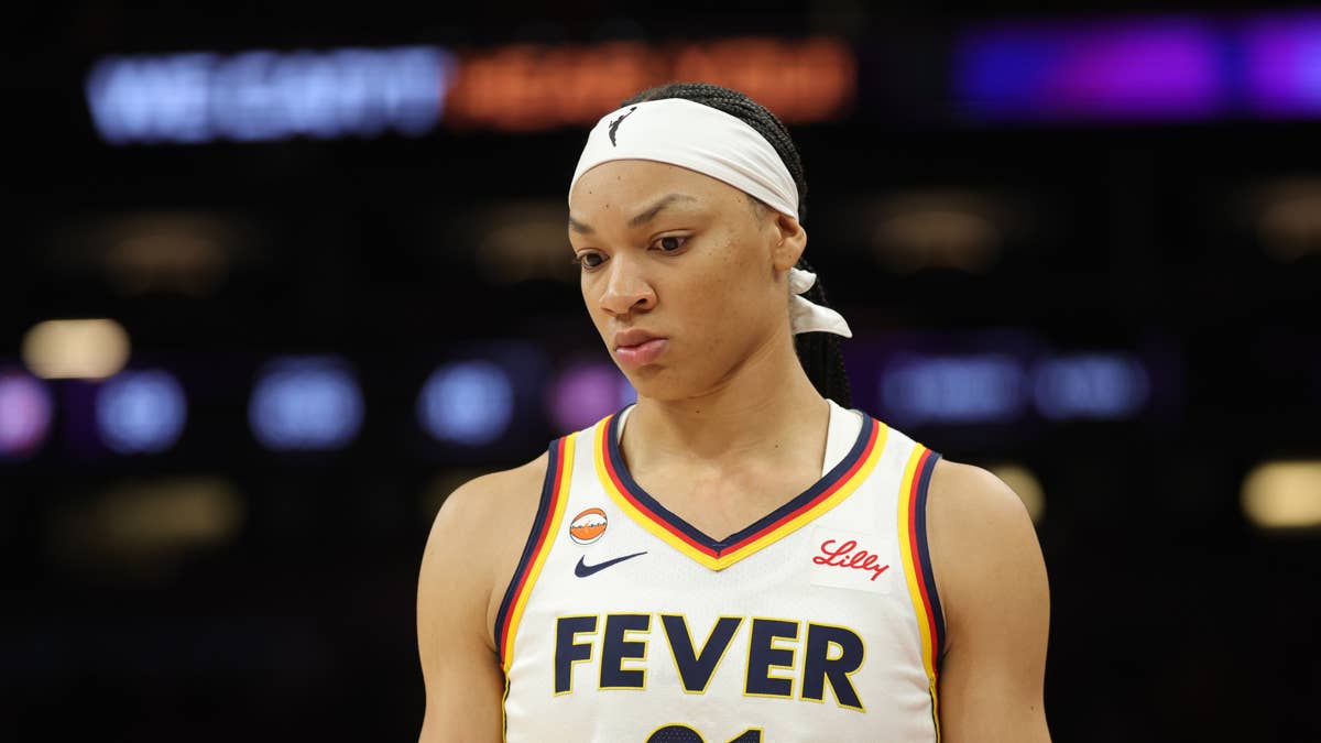 indiana-fever-forward-makayla-timpson-21-looks-on-during-a-game