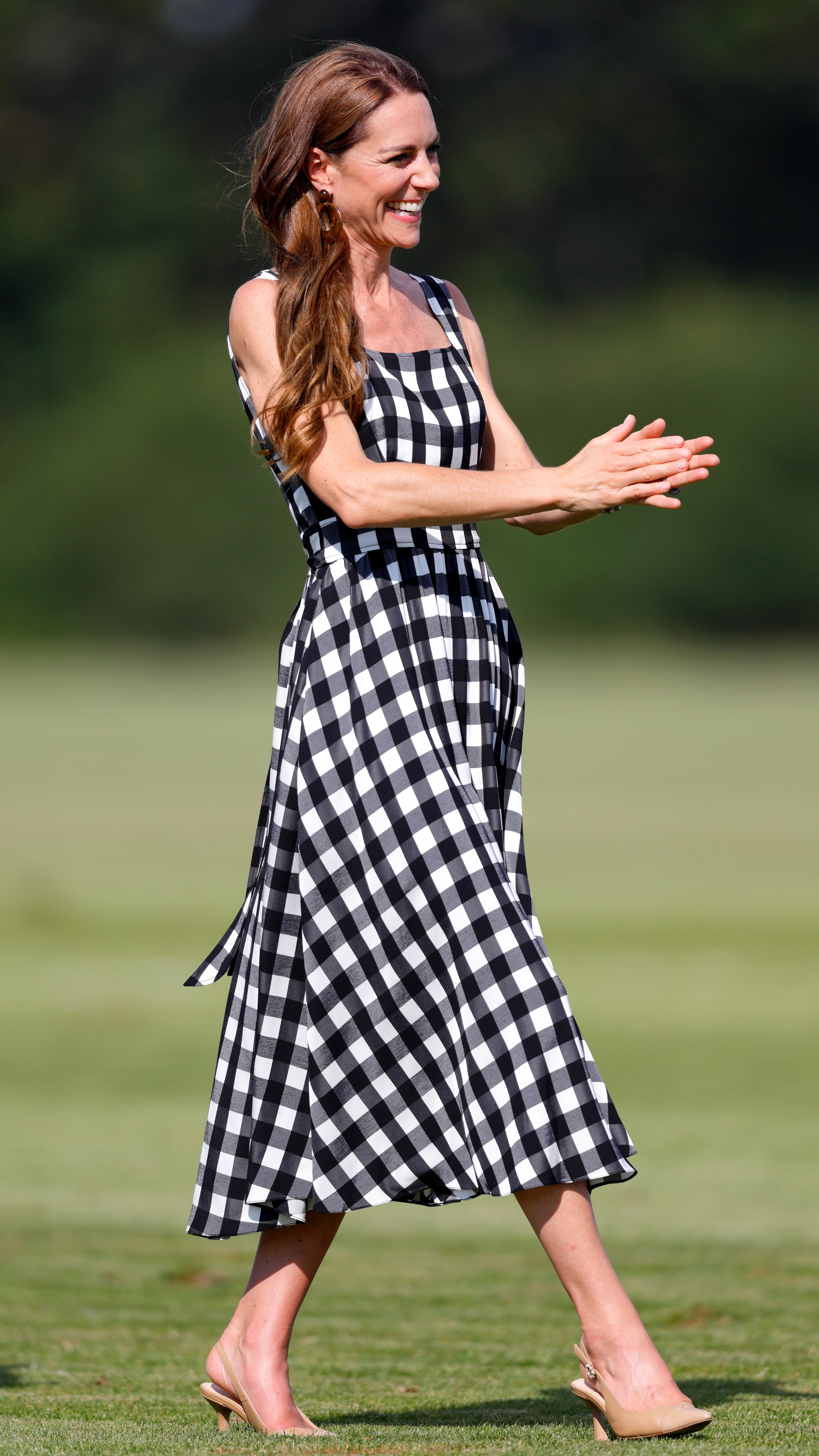 Catherine, Princess of Wales claps as she attends the DMMI Royal Charity Polo Cup 2026