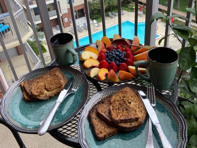 A breakfast on a balcony.