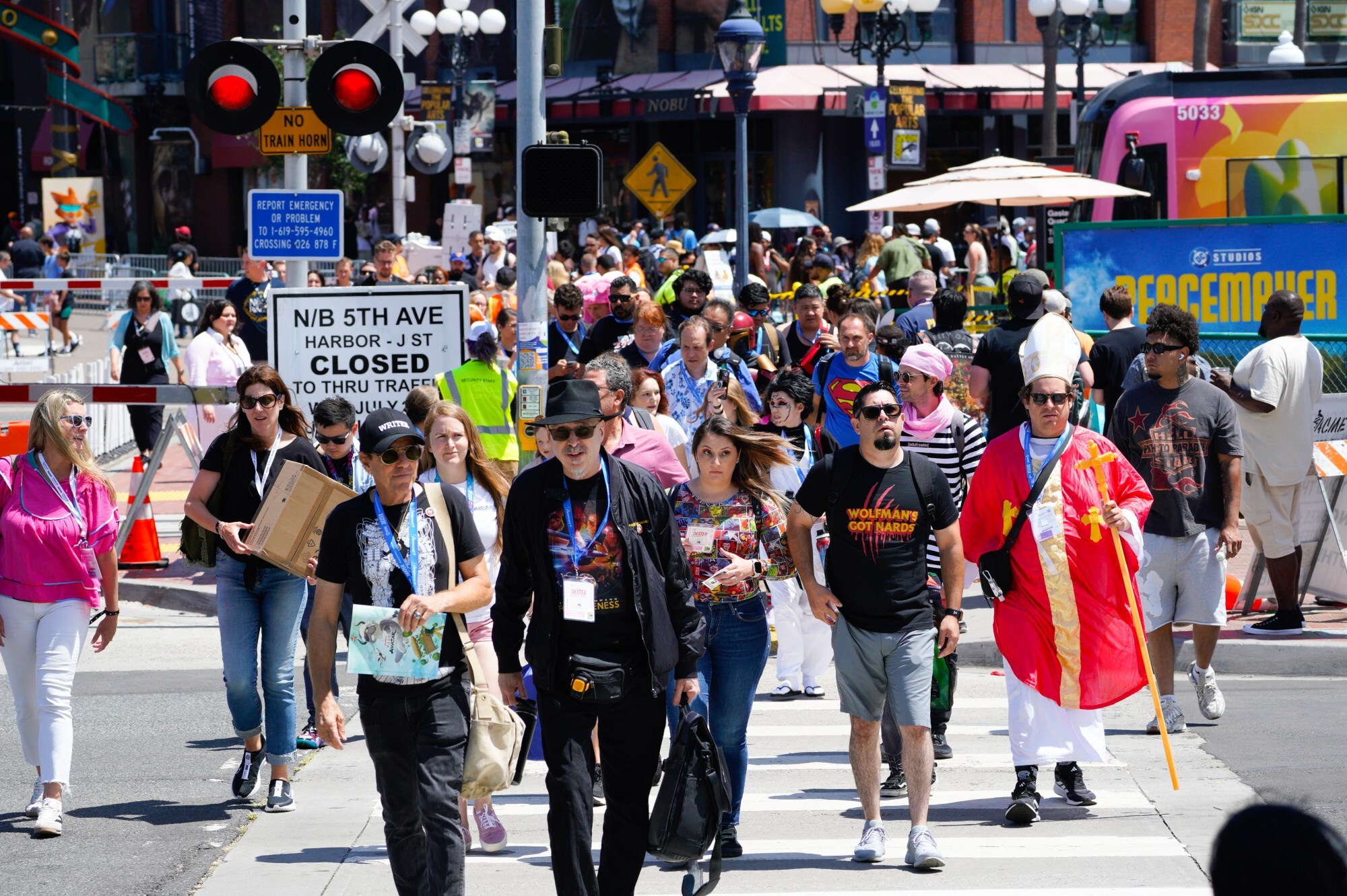 Members cross Harbor Drive on their way to the San Diego Convention Center as Comic-Con 2025 officially opens on Thursday, July 24, 2025, in San Diego, CA.