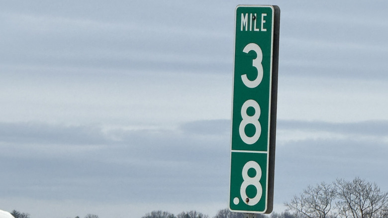 A 38 mile marker with a .8 decimal