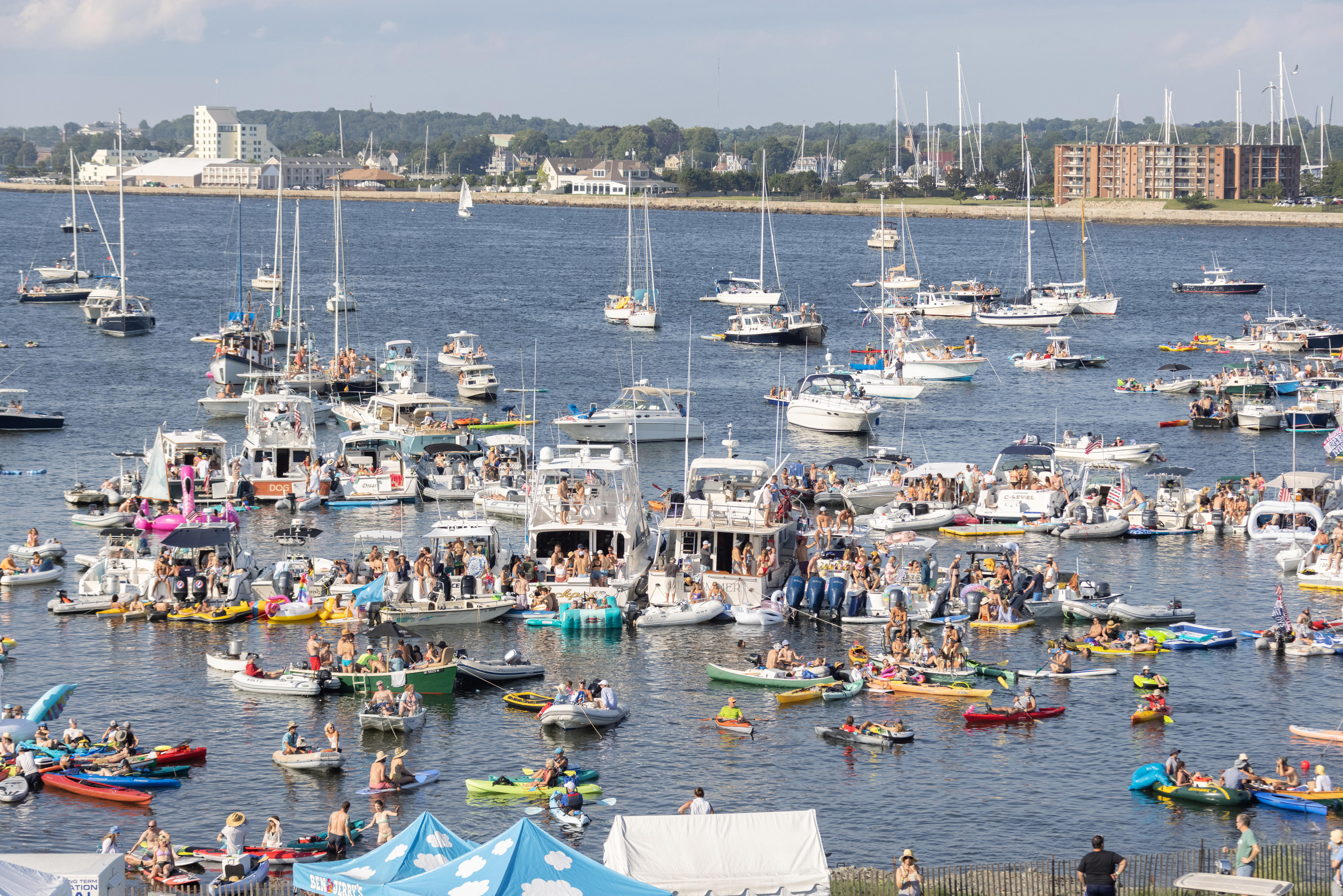 View of the crowd and boats during Newport Folk Festival