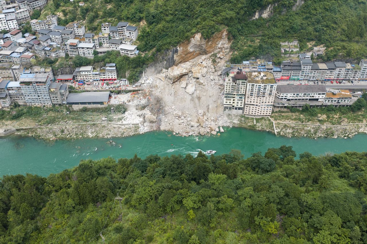 Aerial view of the site of a rainfall-induced landslide along a section of the Wujiang River on July 17, 2026 in Pengshui, Chongqing Municipality of China