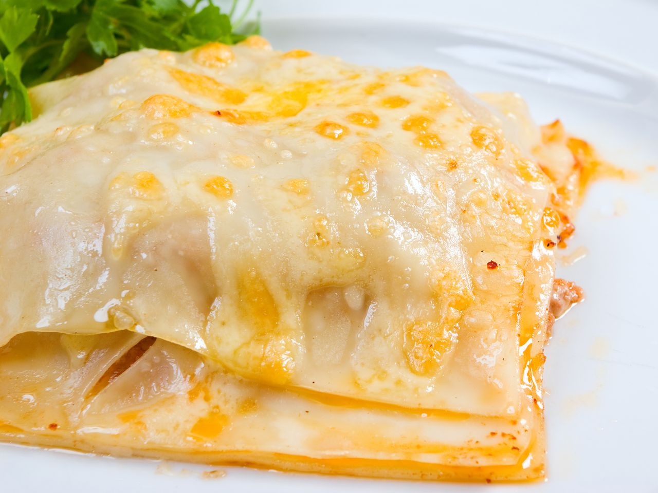 up close shot of lasagna on a plate