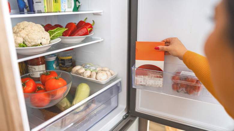 The Clever Cardboard Drink Holder Hack That Will Tidy Up Your Cluttered Fridge