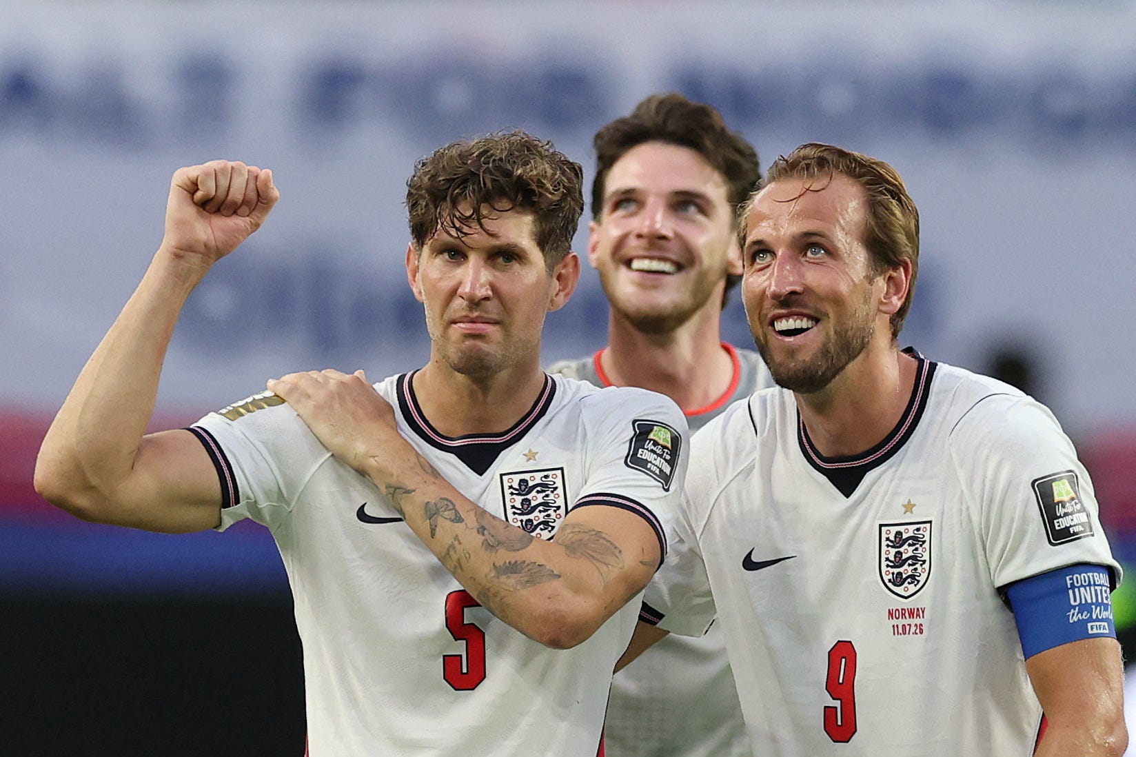 England's John Stones and Harry Kane celebrate after England qualified for the World Cup semifinals by beating Norway in Miami on July 11, 2026.