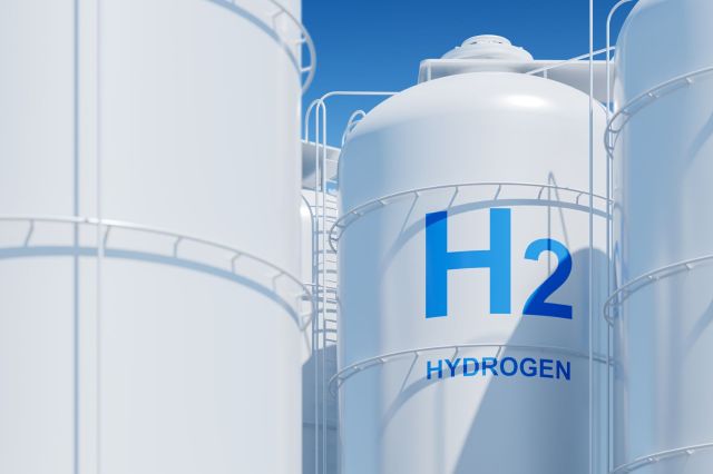 Two white storage tanks labeled
