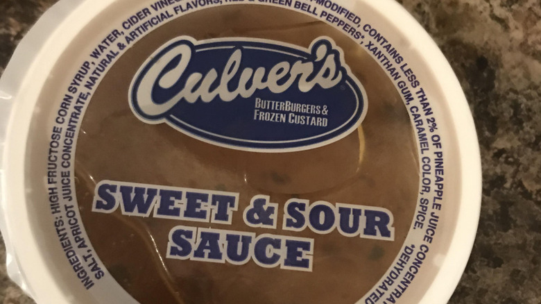 A container of Culver's sweet and sour sauce on a countertop