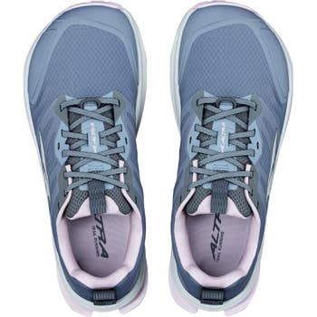 Top view of a pair of athletic trail running shoes with cushioned soles, showcasing lace-up design and branding details