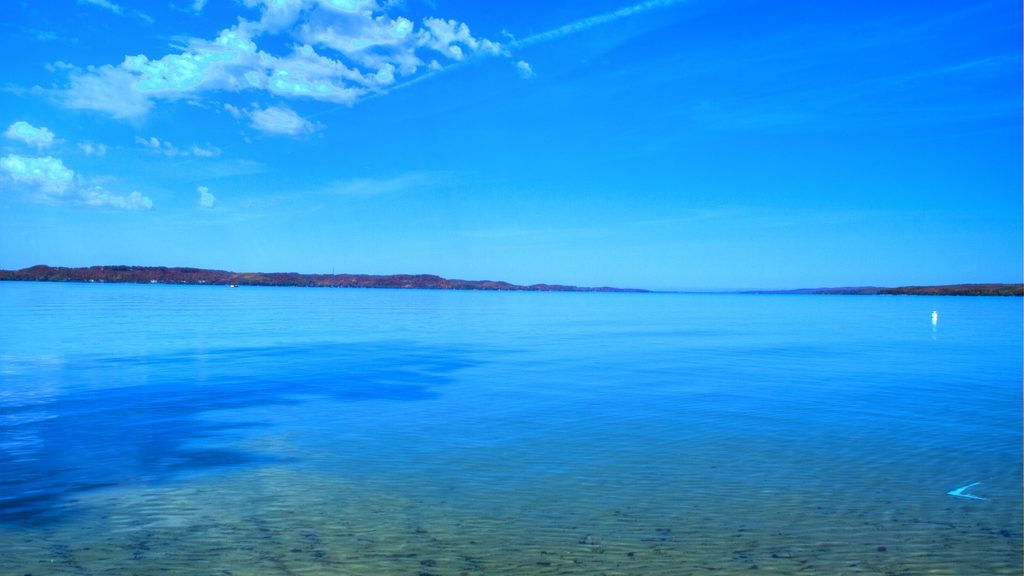 The stunning blue surface of Michigan's Torch Lake.
