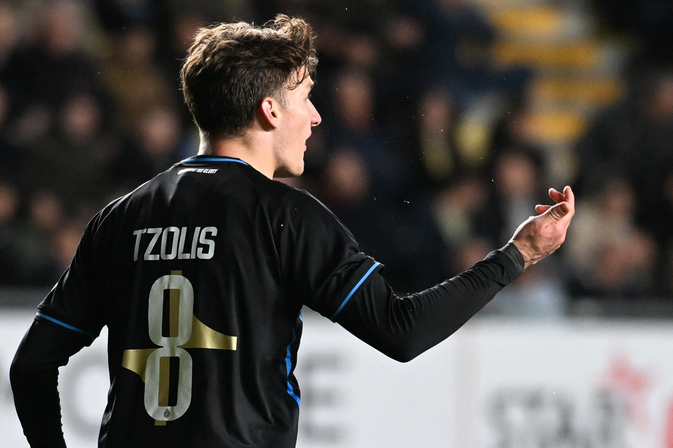Christos Tzolis is set to join Arsenal, but will almost certainly not be wearing the No8 shirt (Belga/AFP via Getty Images)
