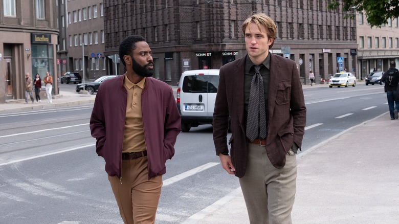 The Protagonist and Neil walking down the street in Tenet