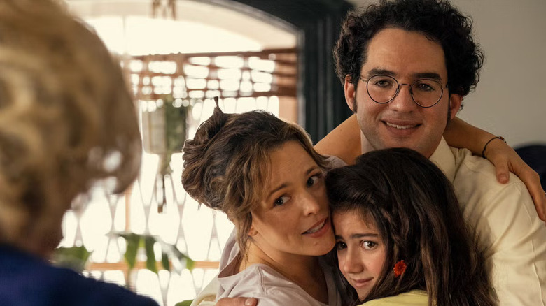 Barbara, Herb, and Margaret hugging in front of Sylvia in Are You There, God? It's Me, Margaret